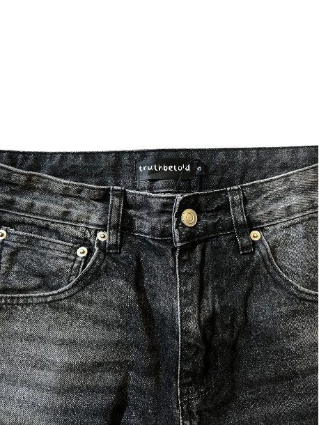 black “telling the truth” vintage wash jean shorts
